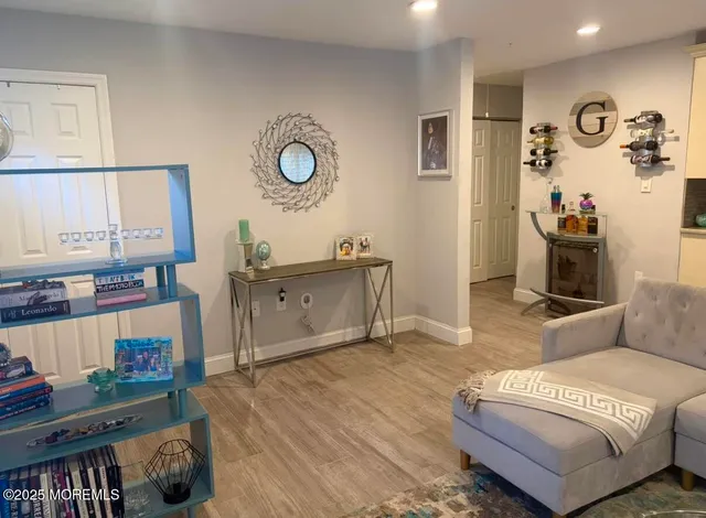 a view of a storage and utility room with washer and dryer