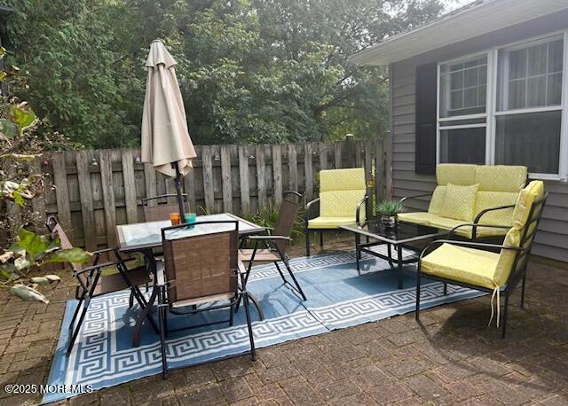 31 Kingsley Way Freehold, NJ 07728 - Photo 25 of 28 a view of a chairs and table in the patio