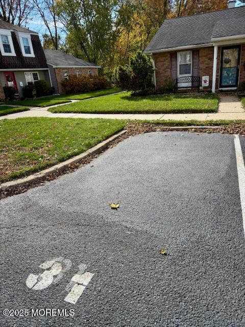 31 Kingsley Way Freehold, NJ 07728 - Photo 27 of 28 a view of a house with a yard