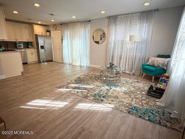 31 Kingsley Way Freehold, NJ 07728 - Photo 10 of 28 a view of an empty room with kitchen and a window