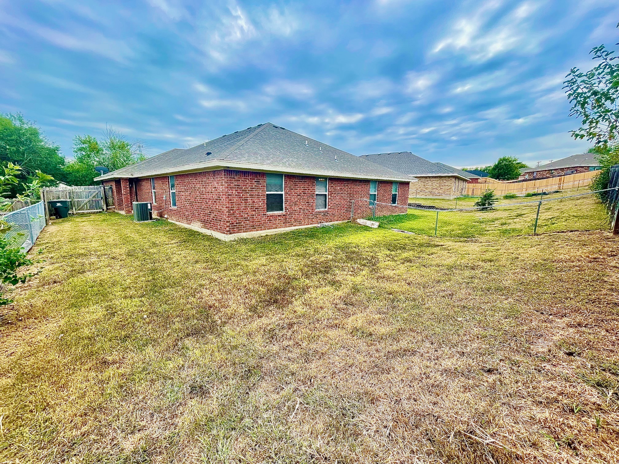 5018 205 Loop, Unit B Temple, TX 76502 - Photo 18 of 18 a view of a house with a yard