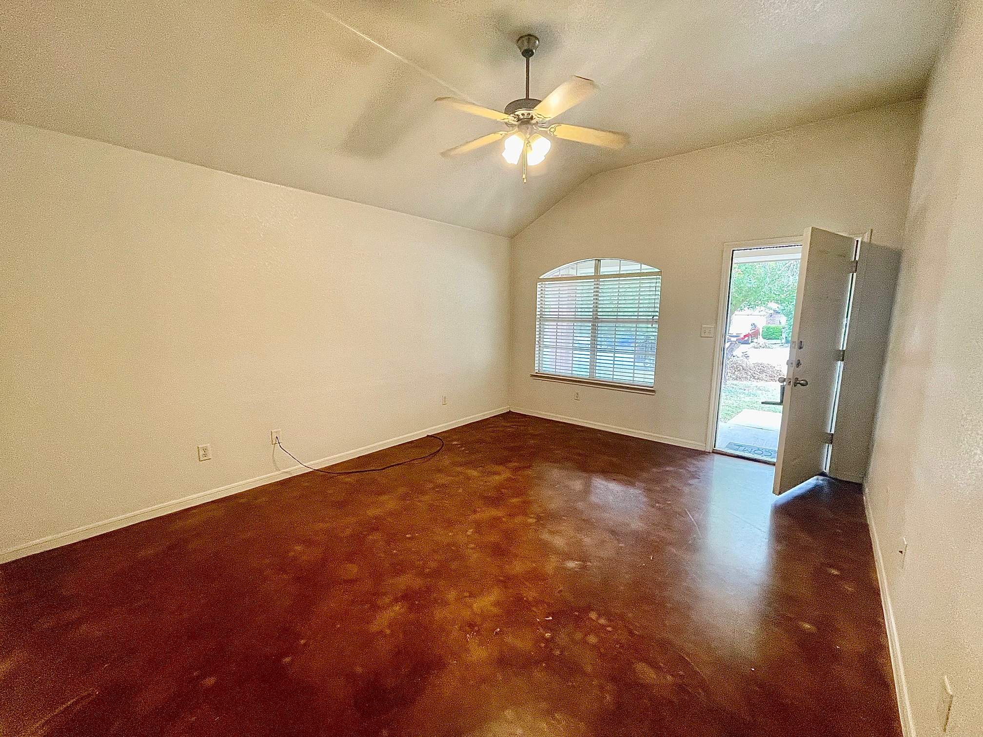5018 205 Loop, Unit B Temple, TX 76502 - Photo 4 of 18 wooden floor in an empty room with a window
