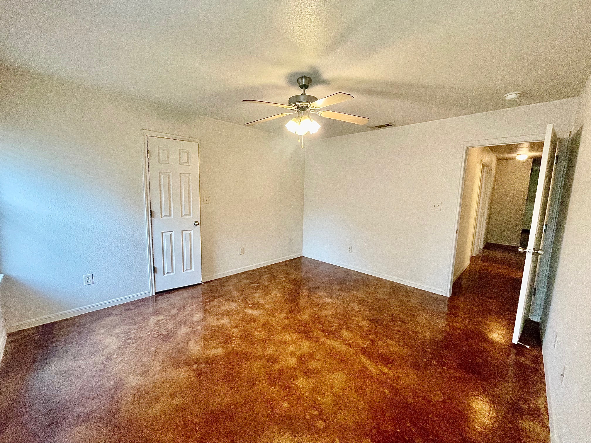 5018 205 Loop, Unit B Temple, TX 76502 - Photo 9 of 18 wooden floor in an empty room