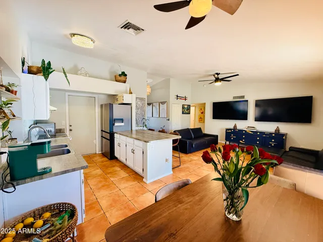 a outdoor space with lots of potted plants