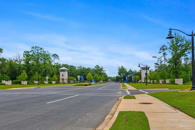 a view of a road and a yard