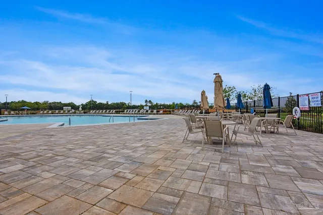 a view of a city with lawn chairs