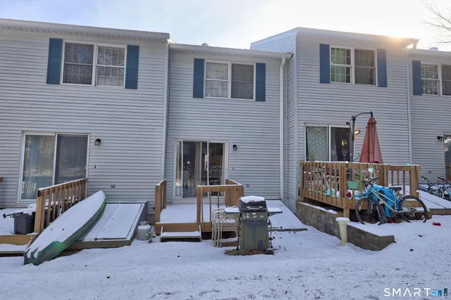 a view of a chairs and a tables in the patio