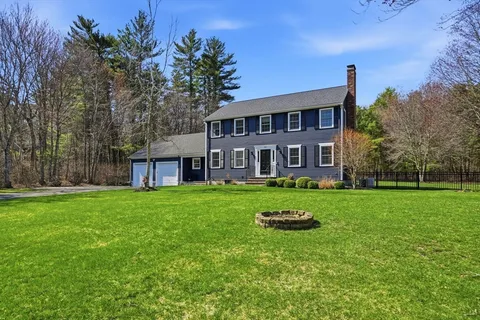 a house view with a garden space
