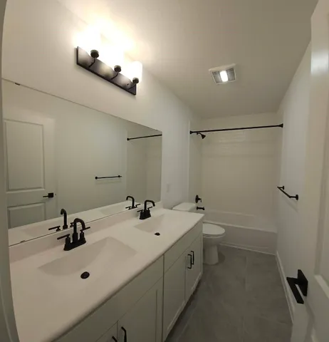 a house view with a garden space