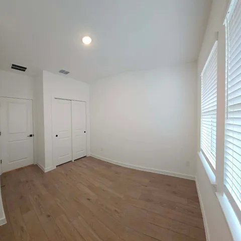 a view of an empty room and window