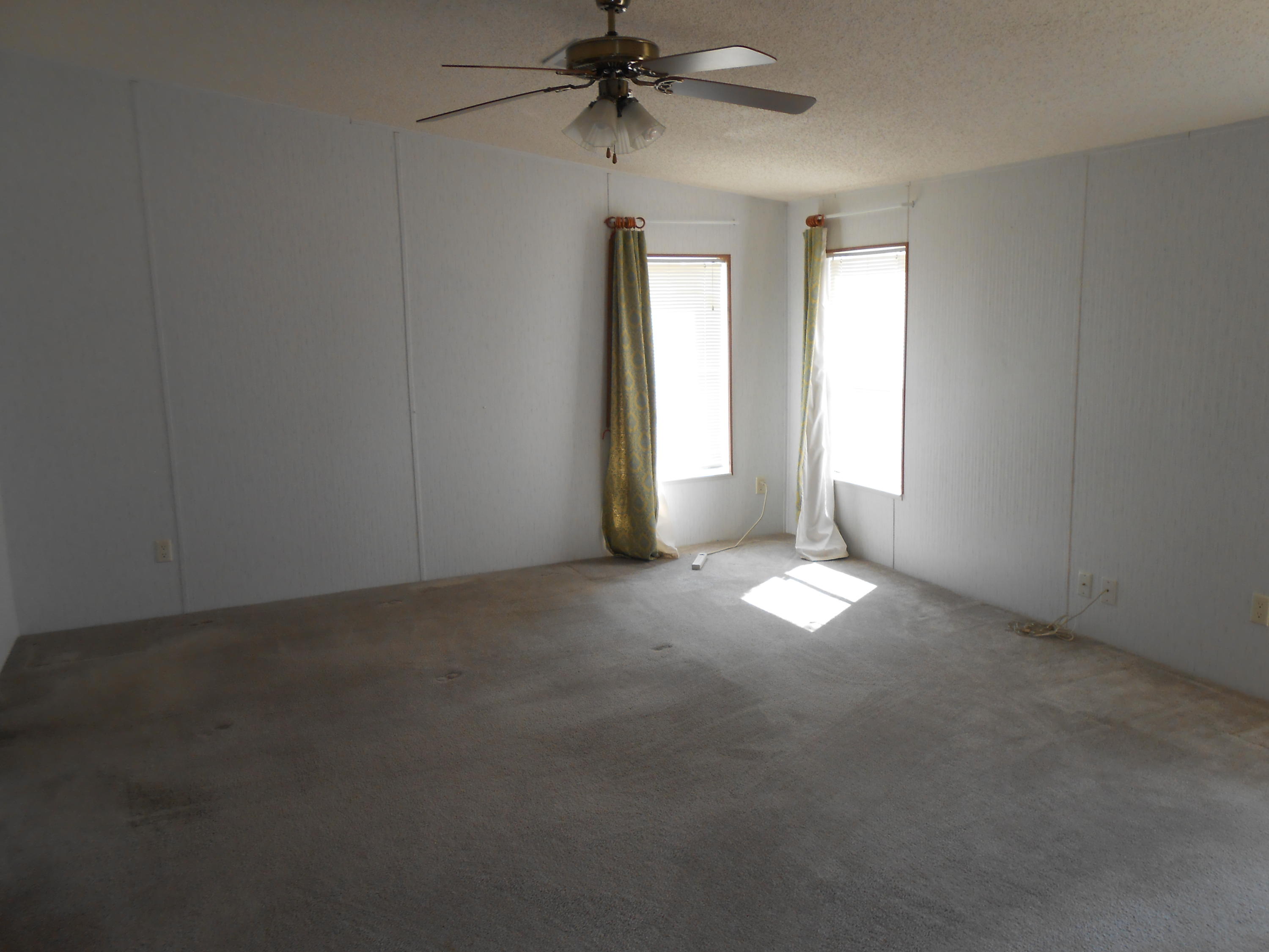 93 West Raphael Road DeFuniak Springs, FL 32433 - Photo 7 of 27 an empty room with windows and closet