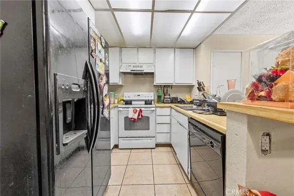 a bedroom with a bed and a cabinets