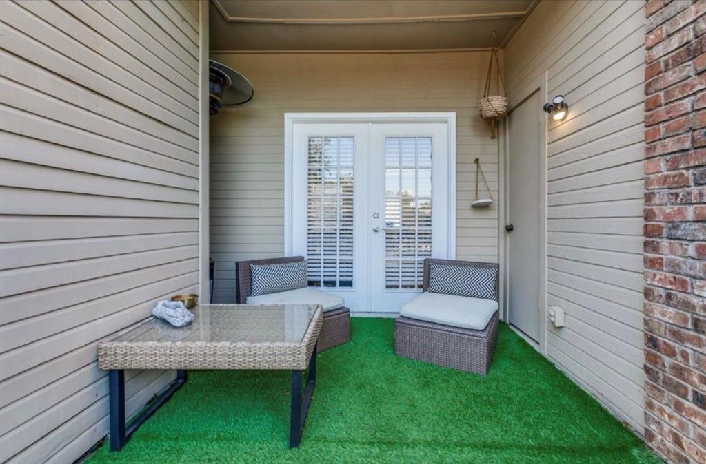 3550 Country Square Drive, Unit 109 Carrollton, TX 75006 - Photo 12 of 13 View of patio / terrace with french doors