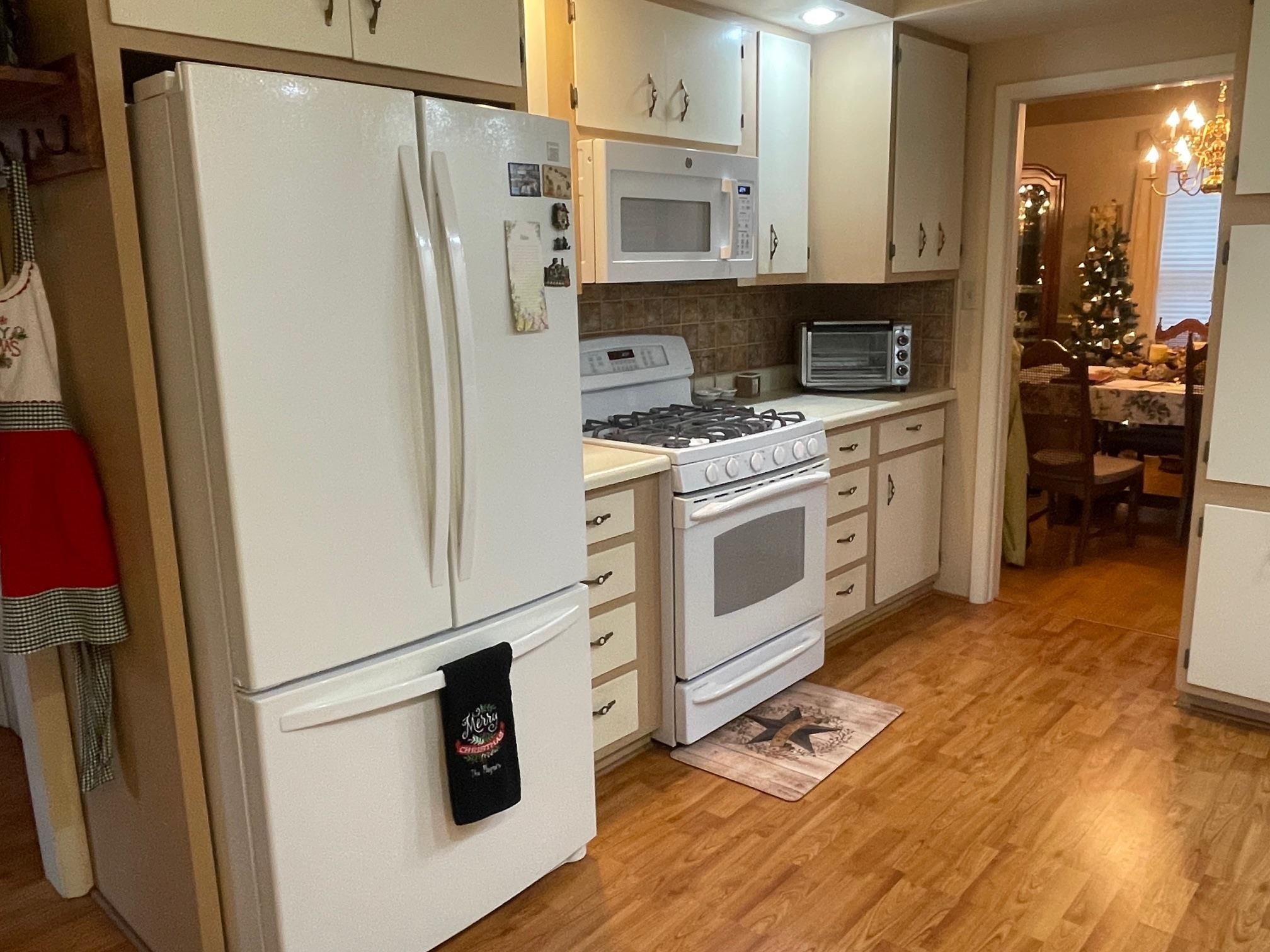 2004 Wall Street Murphysboro, IL 62966 - Photo 17 of 30 a kitchen with stainless steel appliances a refrigerator stove and sink