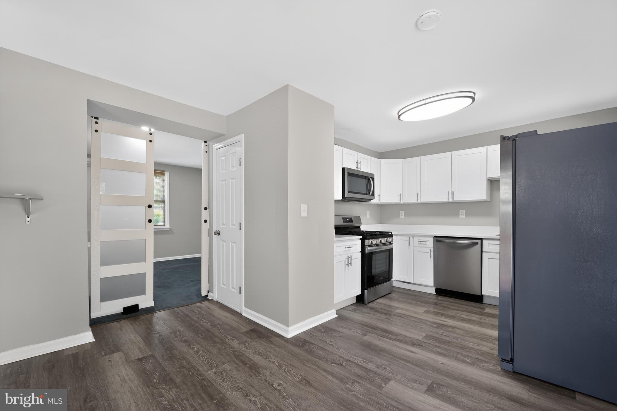 8103 Cornwall Road Dundalk, MD 21222 - Photo 7 of 18 Modern kitchen with sleek finishes.