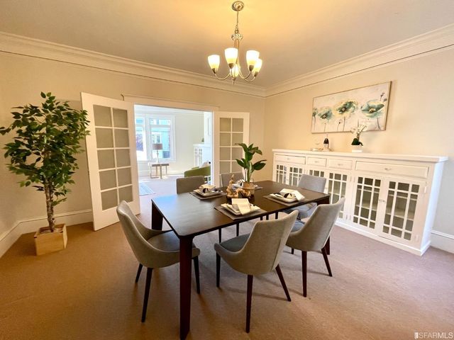 a white toilet sitting next to a window