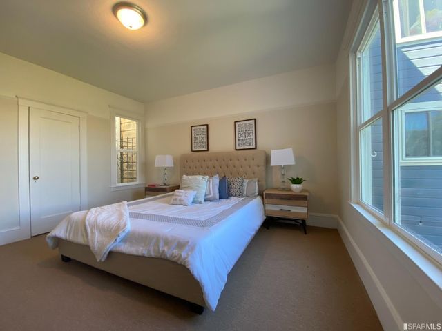 a view of a backyard with a small cabin