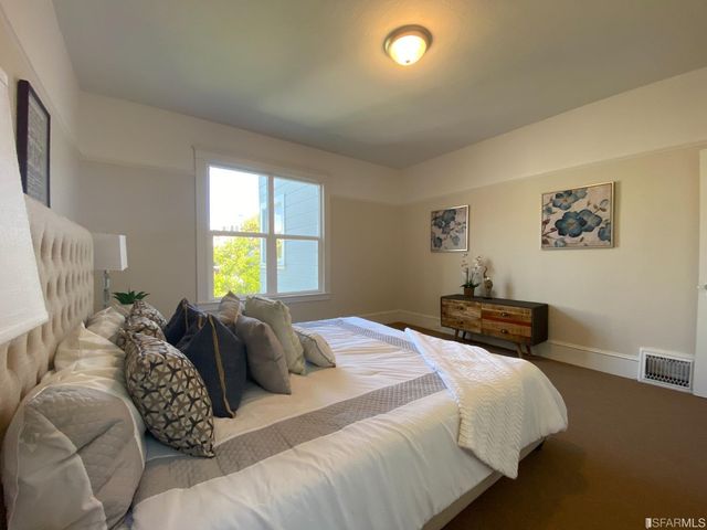 a view of a house with a street