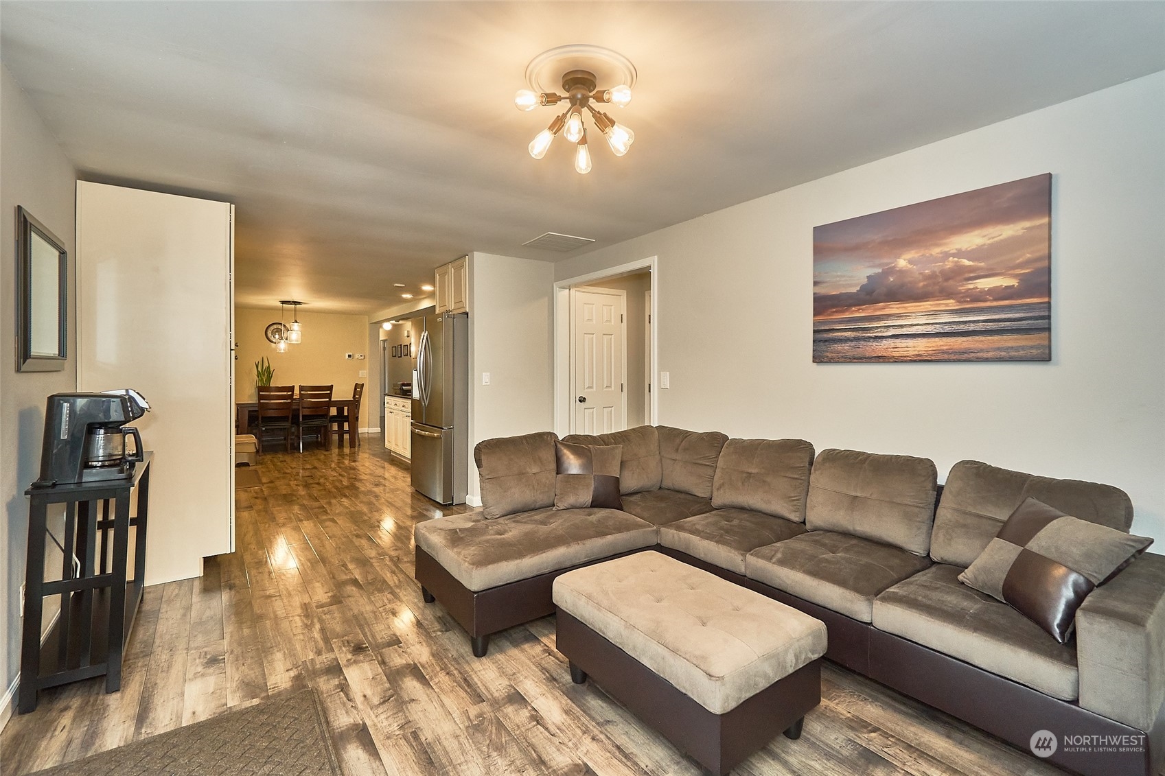 108 183rd Street Southwest Bothell, WA 98012 - Photo 11 of 22 a living room with furniture and a chandelier