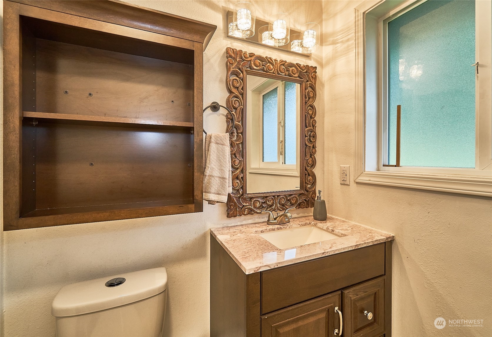 108 183rd Street Southwest Bothell, WA 98012 - Photo 13 of 22 a bathroom with a sink a toilet and a mirror