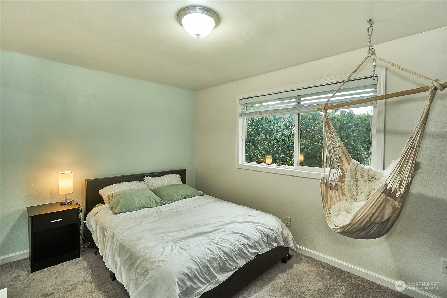 108 183rd Street Southwest Bothell, WA 98012 - Photo 16 of 22 a bedroom with a bed and a mirror