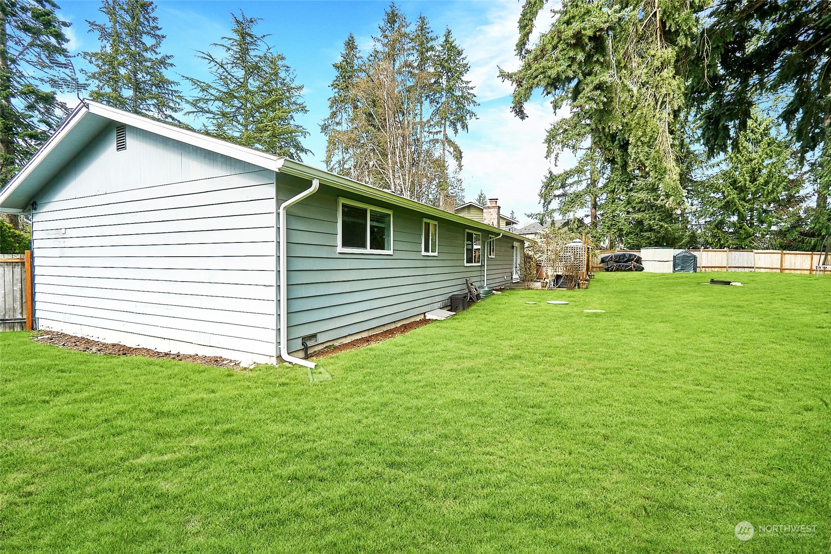 108 183rd Street Southwest Bothell, WA 98012 - Photo 3 of 22 a view of a backyard with a garden