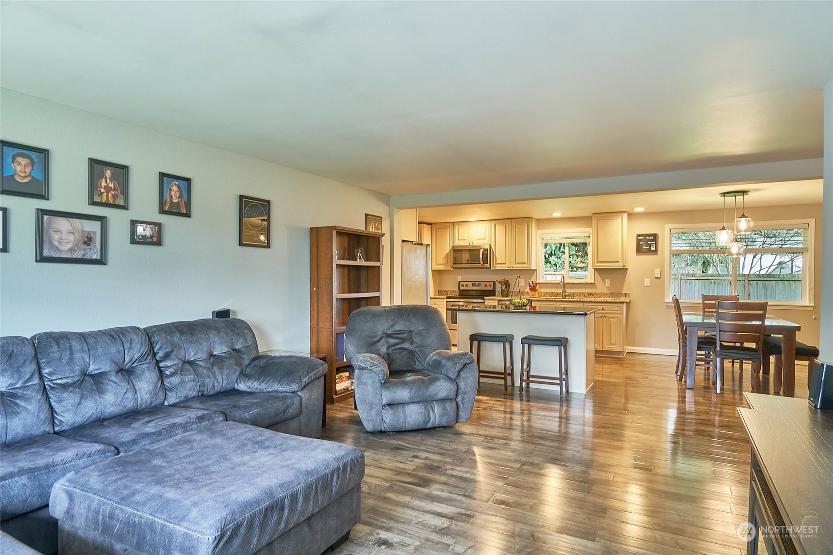 108 183rd Street Southwest Bothell, WA 98012 - Photo 5 of 22 a living room with furniture wooden floor and kitchen view
