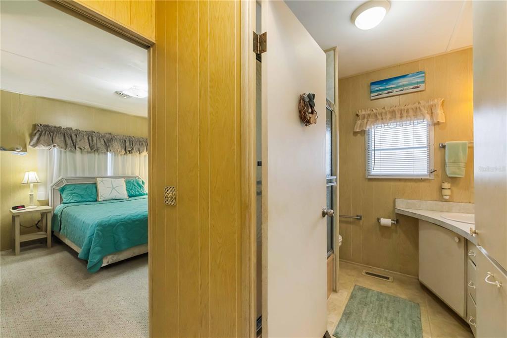 239 Inner Drive East Venice, FL 34285 - Photo 22 of 48 a bathroom with a sink a toilet and shower