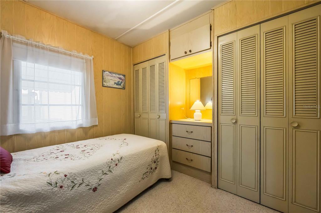 239 Inner Drive East Venice, FL 34285 - Photo 28 of 48 a bedroom with a bed and a window