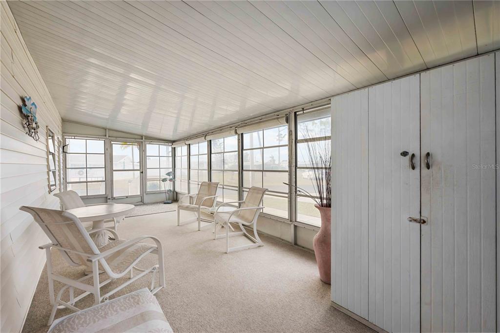 239 Inner Drive East Venice, FL 34285 - Photo 31 of 48 a room with lots of table and chairs