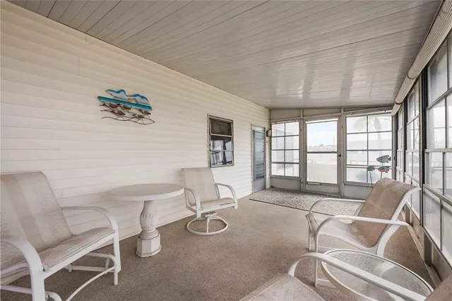 a view of a terrace with a lounge chair