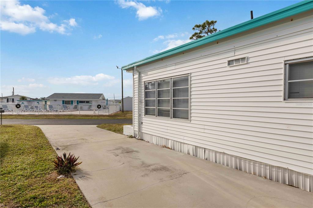 239 Inner Drive East Venice, FL 34285 - Photo 35 of 48 a view of a terrace with a lounge chair