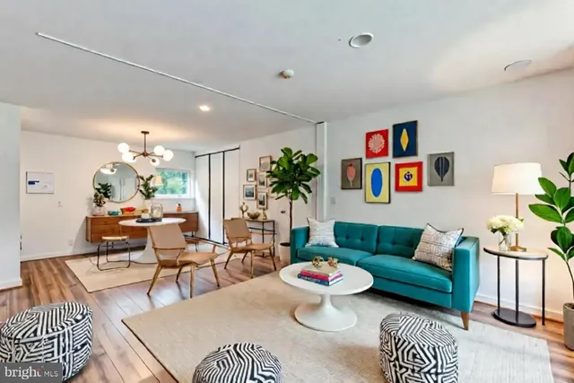 a view of an empty room with a large window