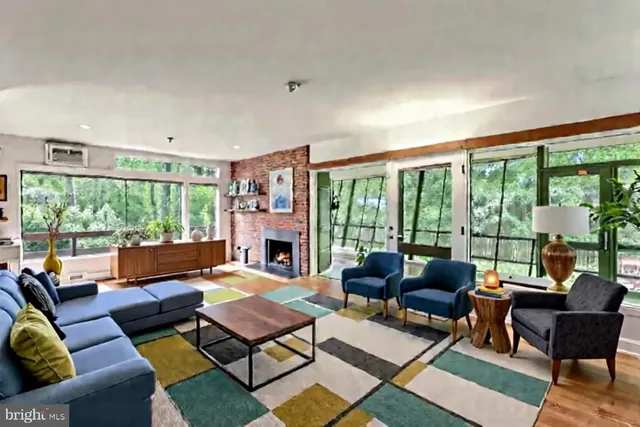 a view of a room with a large window