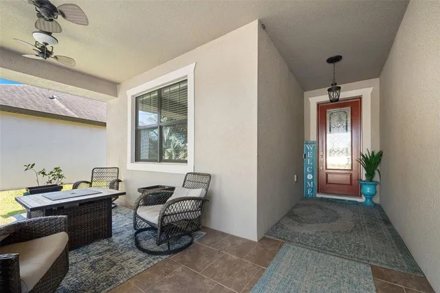 a room with furniture and a window