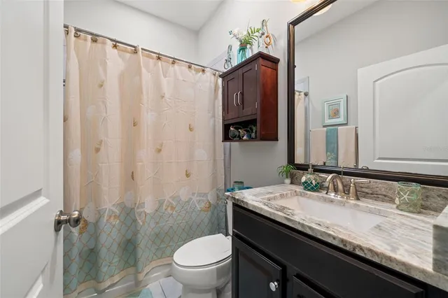a view of a utility room with closet
