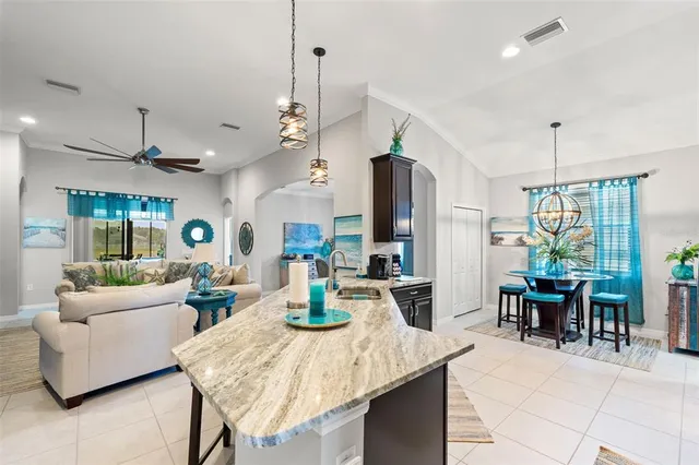 a kitchen with granite countertop counter space cabinets and appliances