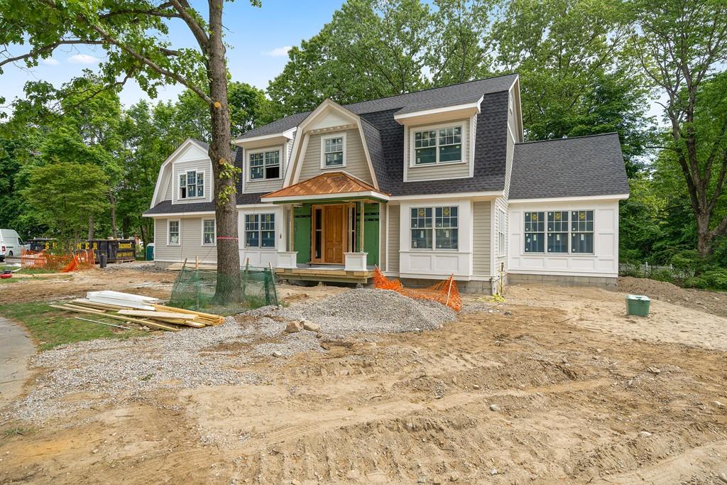 80 Fuller Brook Road Wellesley, MA 02482 - Photo 1 of 11 a house with trees in the background