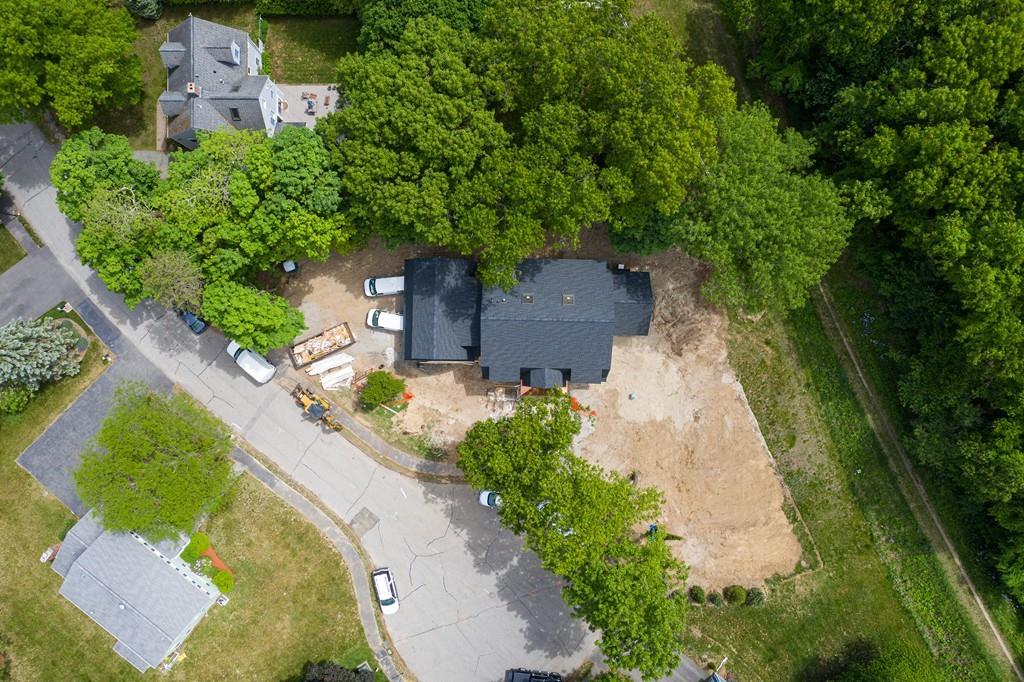 80 Fuller Brook Road Wellesley, MA 02482 - Photo 3 of 11 an aerial view of a house with a garden