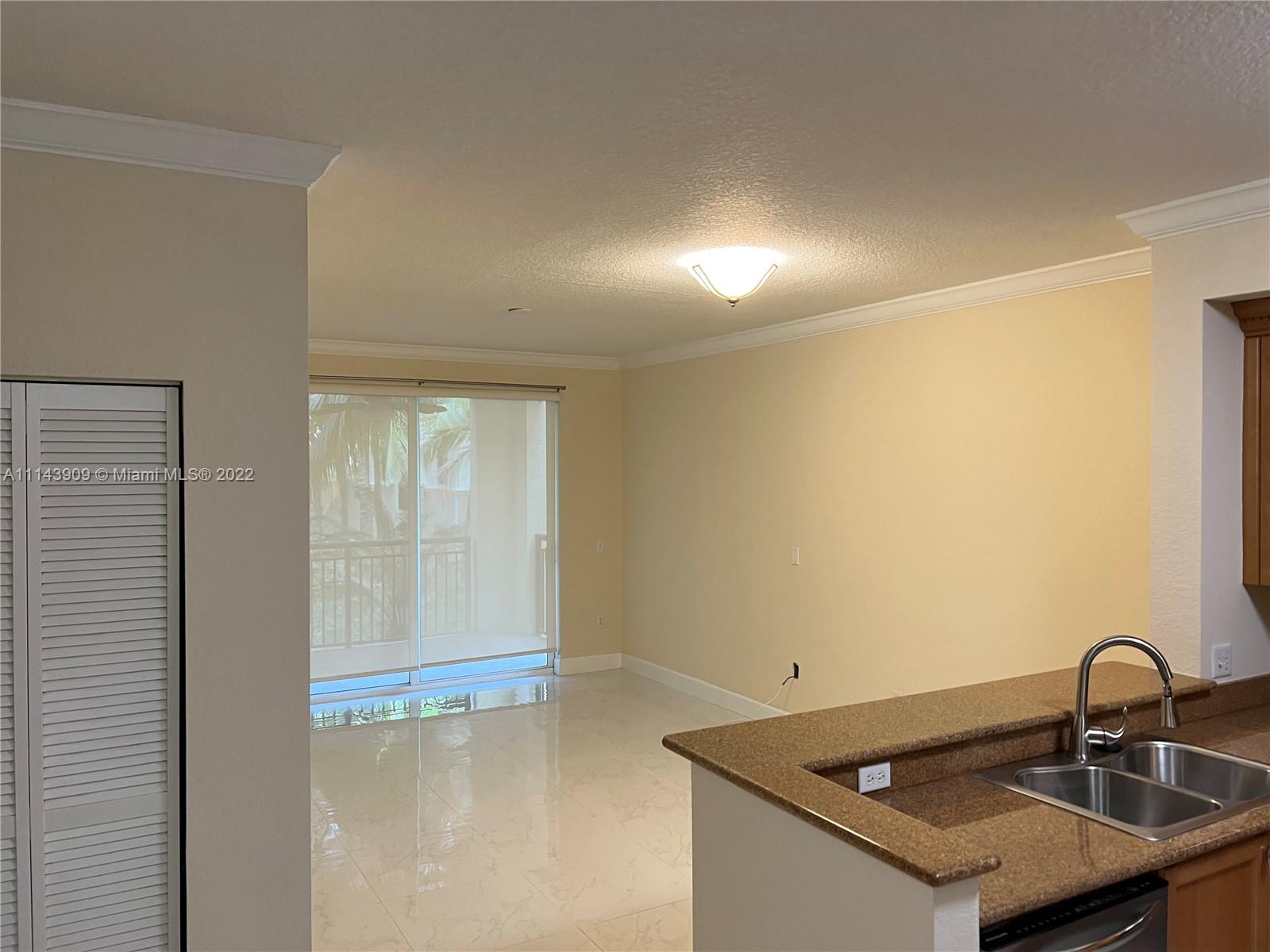 Renaissance Commons Boynton Beach, FL 33426 - Photo 2 of 10 a bathroom with a sink and a mirror