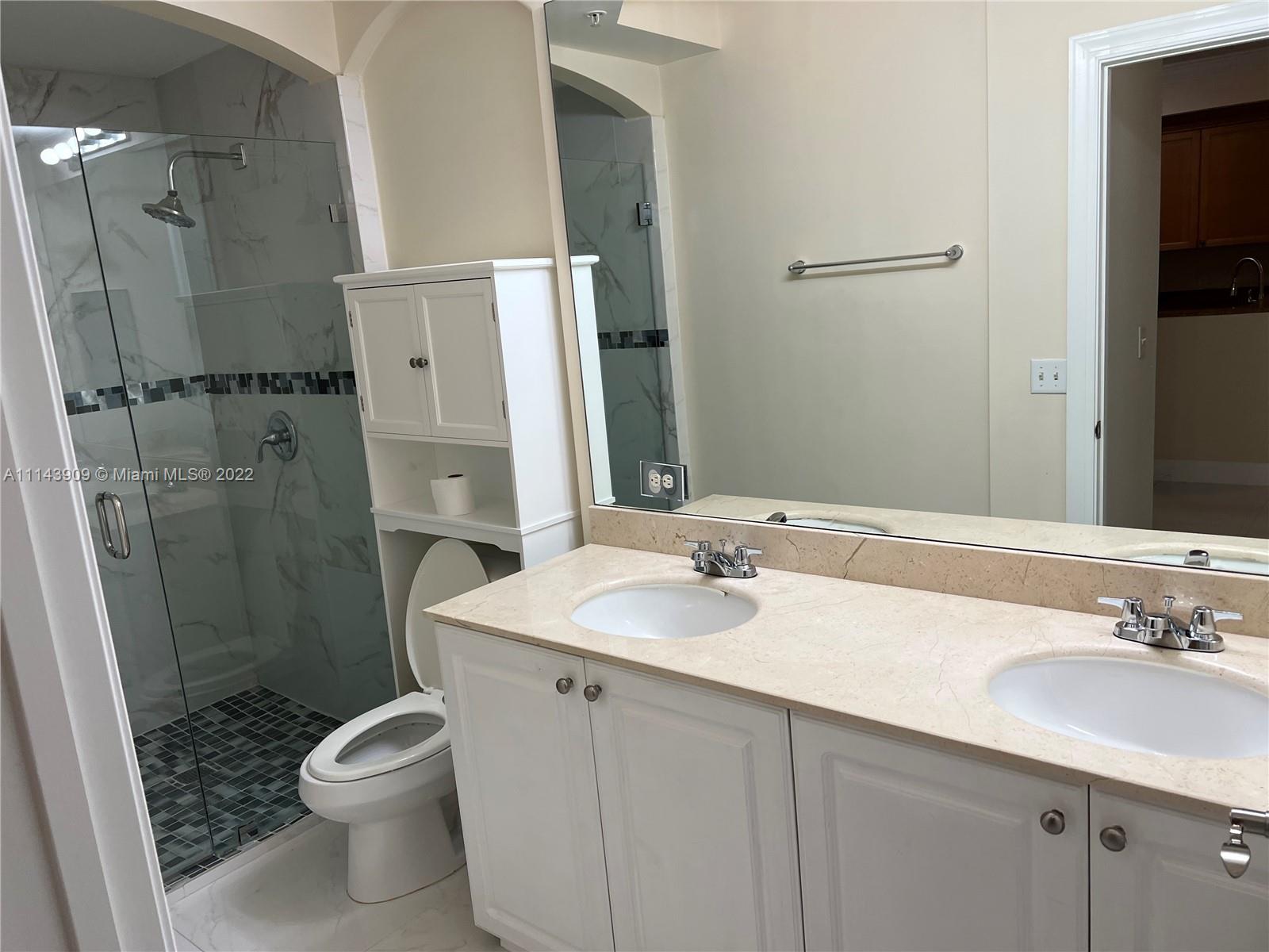 Renaissance Commons Boynton Beach, FL 33426 - Photo 6 of 10 a bathroom with a sink toilet and shower