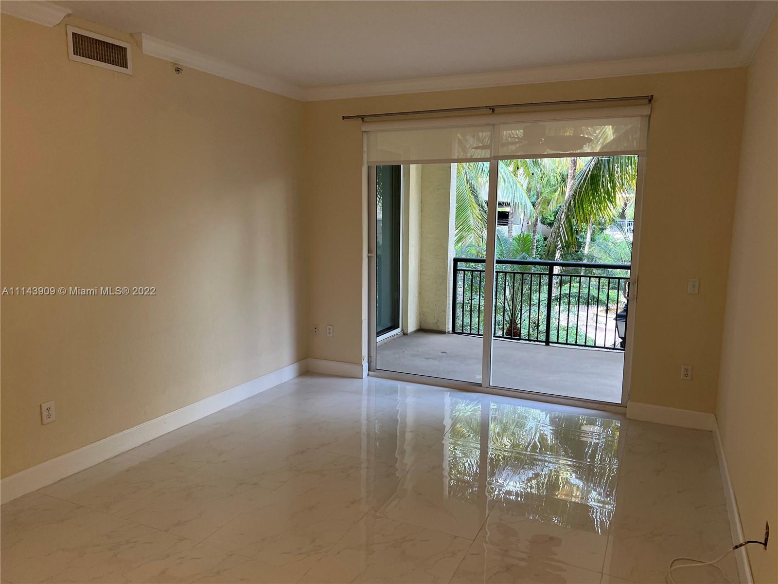 Renaissance Commons Boynton Beach, FL 33426 - Photo 10 of 10 a view of empty room with wooden floor and fan
