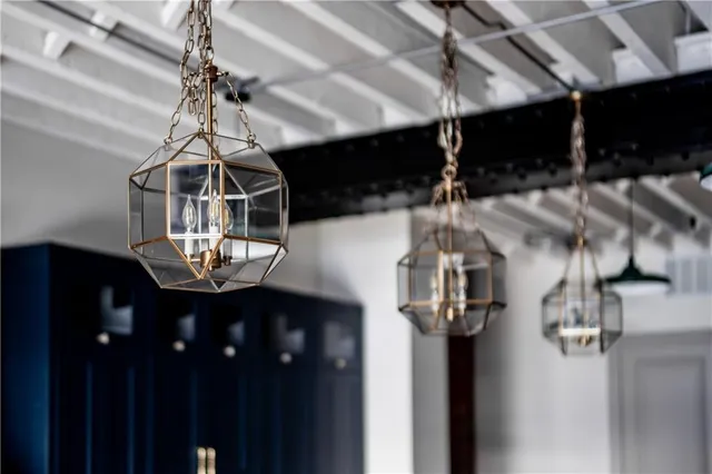 a kitchen with a refrigerator and a sink