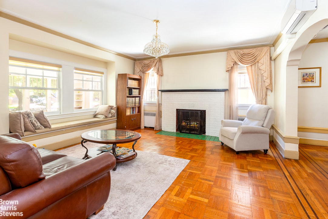 1917 Glenwood Road Brooklyn, NY 11230 - Photo 2 of 22 a living room with furniture fireplace and window
