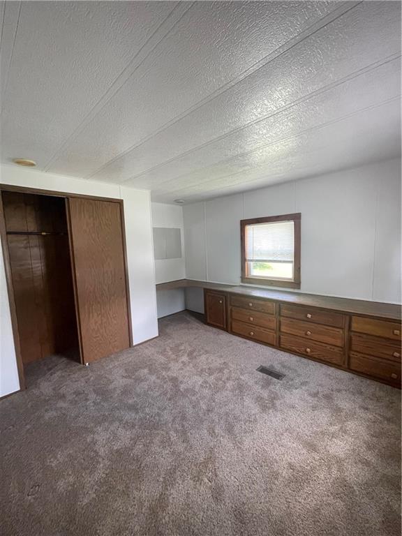20 Jones Street, Unit 10 Stoneboro, PA 16153 - Photo 12 of 24 a view of an empty room and window