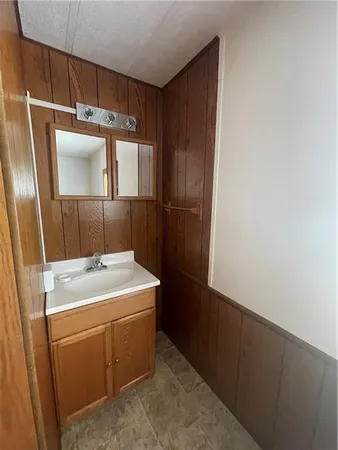 a utility room with a sink dryer and washer