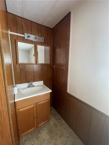 a utility room with a sink dryer and washer