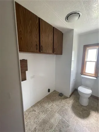 a bathroom with a sink and a toilet
