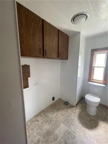 a bathroom with a sink and a toilet