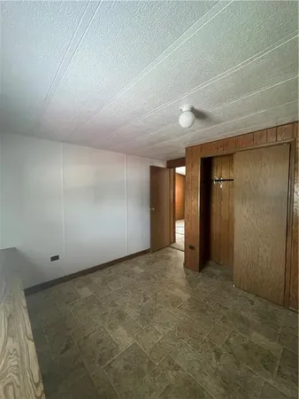 an empty room with an entryway